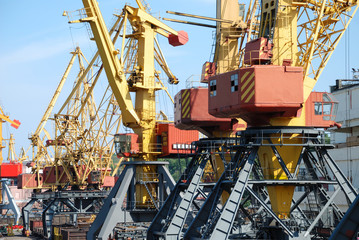 The trading seaport with cranes and ships