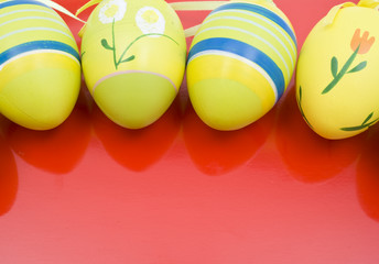 Easter eggs on red background