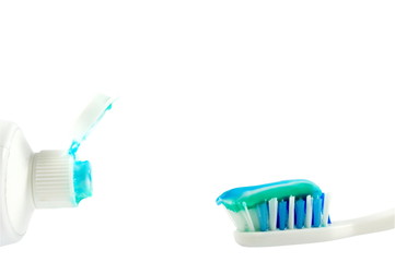 Tooth paste and tooth brush isolated over white