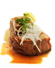 Grilled pork meat with  soy sause, white onion and ginger