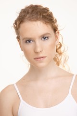 Attractive young female in gym suit