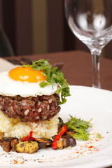 beef burger with egg and potatoes