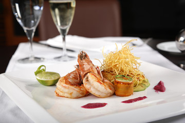 Royal tiger shrimps with sauces and lemon