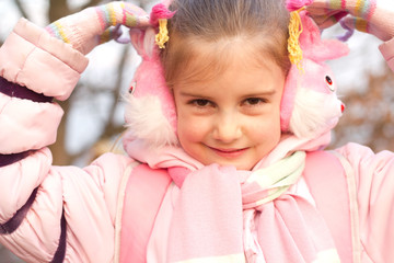 Winter happiness, adorable little girl with winter clothes