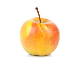 one yellow with red apple over white background