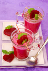 beet soup with cream in glass