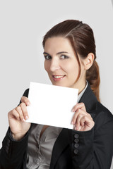 Naklejka premium Holding a cardboard