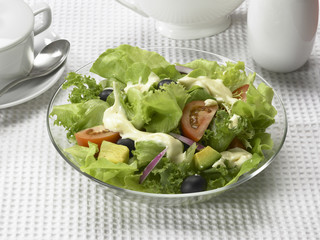 Mix salad with Mayonnaise.