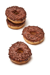 Chocolate covered ring donuts on a white studio background.