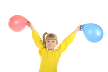Little girl with colour balls