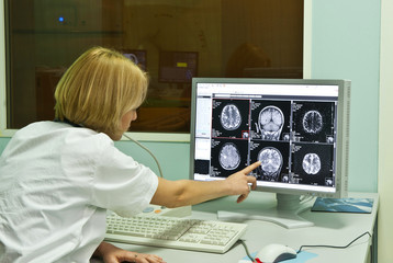 Fototapeta na wymiar Radiologist analyzing x-ray image