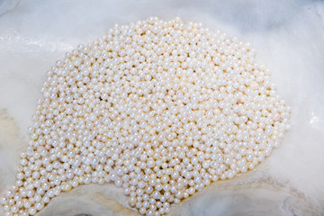 White pearls in a shell