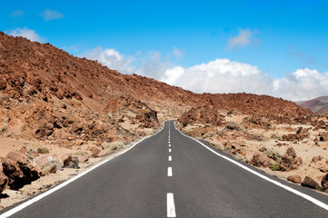 Road crossing an arid mountain on Lanzarote island,Canary,Spain