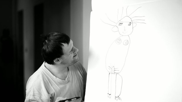 down syndrome homme dessinant