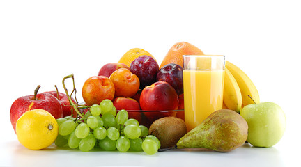 Variety of fruits and glass of orange juice isolated on white