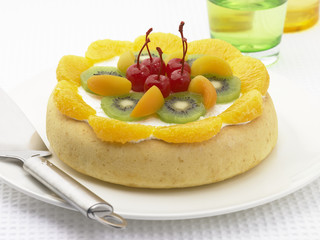 Cake with fruity topping.