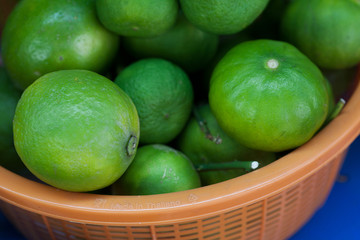Fresh and green lemons