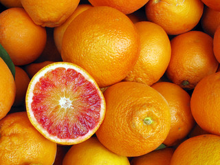 Fresh blood red oranges in market