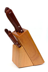 Set of knives in a wood suport