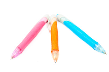 pink, blue, orange pen