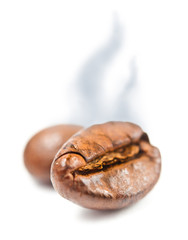 Coffee bean macro aroma with steam isolated on white