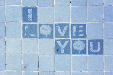 Obraz premium I love you on the tiles