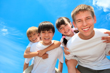 Happy young children outdoors