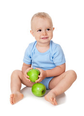 Fototapeta na wymiar The child with an apples