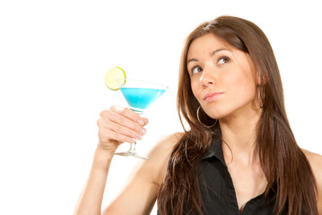 Brunette woman holding popular blue tropical martini cocktail