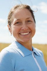 Mature woman in blue