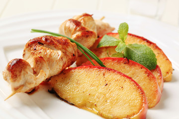 Chicken skewer and baked apple