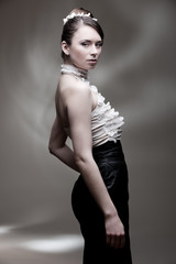 stylish model over grey background