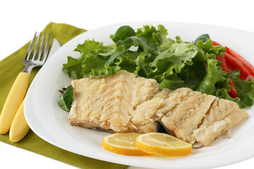 boiled codfish with lemon and salad