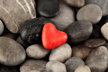 Red Heart on pebbles