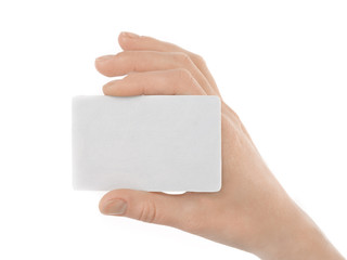 Female hand holding a blank paper