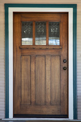 Decco glassed stained wood door