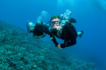 scuba divers having fun