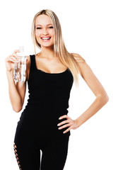 Cheerful beautiful woman with a bottle of fresh water