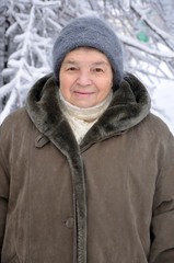 Portrait of an old woman in winter