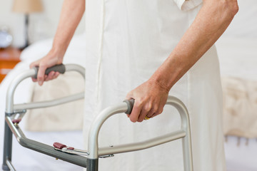 Senior woman with her zimmer frame