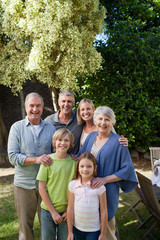 Fototapeta premium Portrait of a joyful family looking at the camera