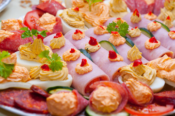 Traditional food made out of ham eggs and paste with vegetable