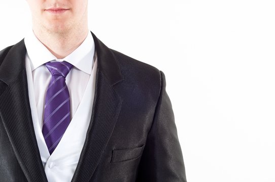 Young Buisnessman With Purple Tie On White Background