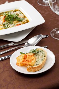 fish soup with potato chips and fish pie