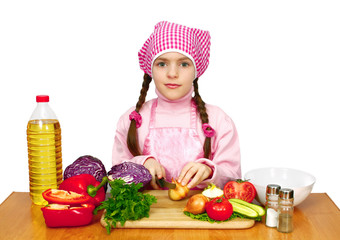 girl preparing lettuce from vegetables
