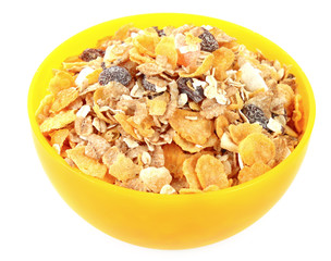 Muesli in bowl isolated on white