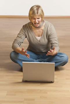young woman having trouble with her computer