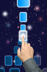 hand pushing a button on a touch screen interface under starry