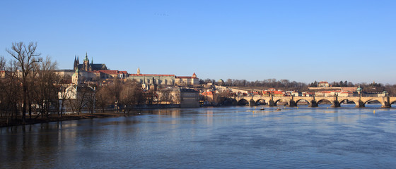 Prague - view of Vltava river and Charles bridge with Prague cas