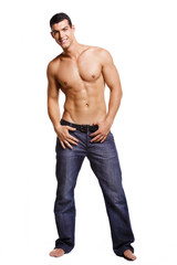 Fototapeta premium Healthy muscular young man. Isolated on white background.